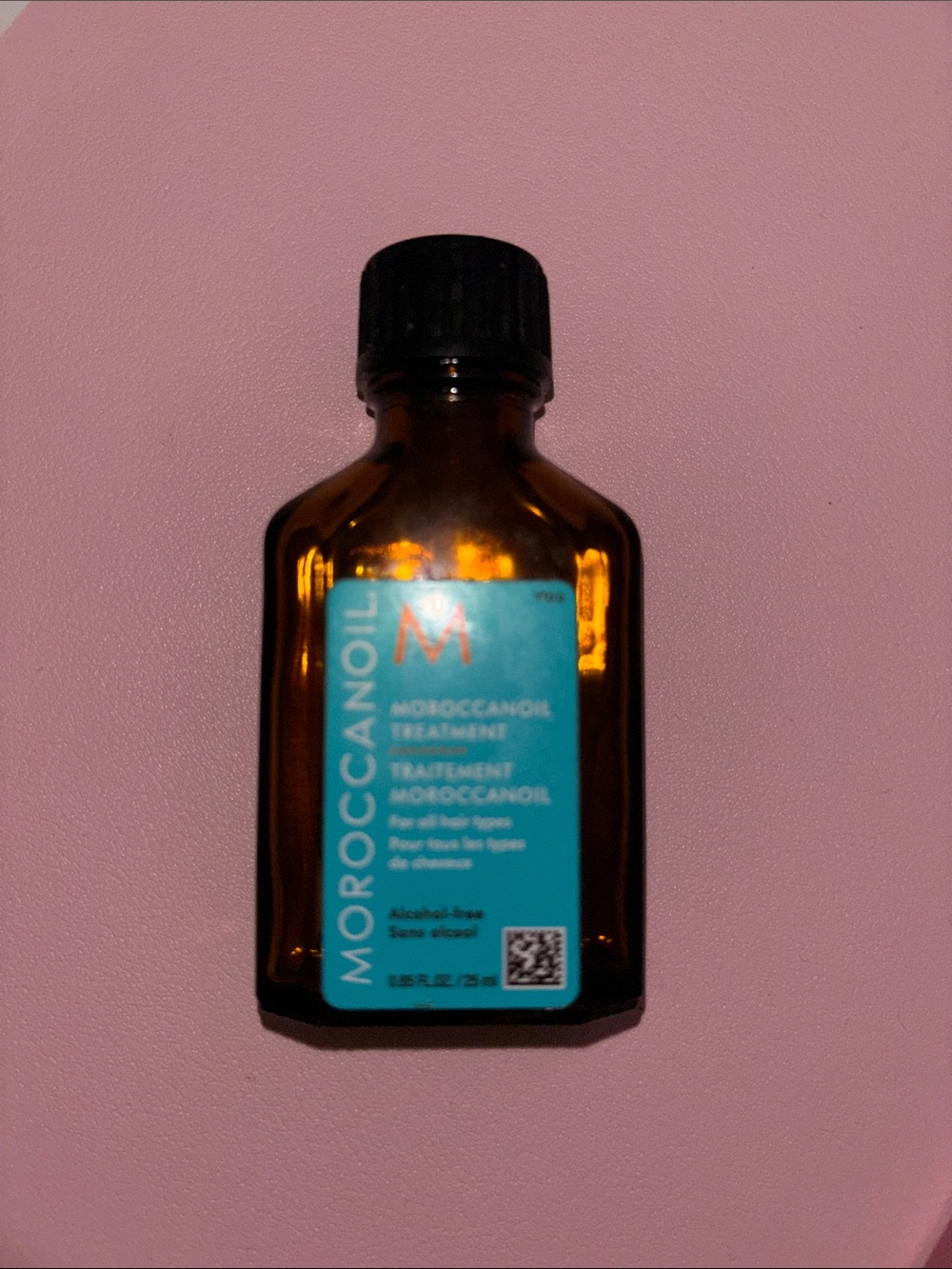 Moroccanoil Amber Bottle with Turquoise Label and Black Cap